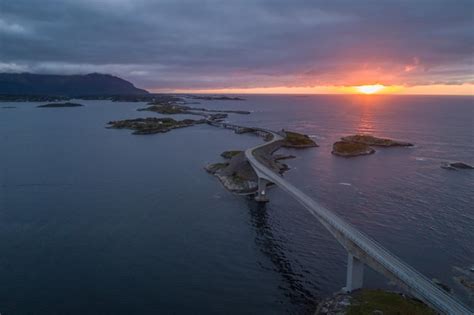 Premium Photo | Atlantic road in norway at sunset. dramatic sky. aerial ...