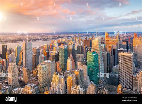 Aerial view of Manhattan skyline at sunset, New York City Stock Photo ...