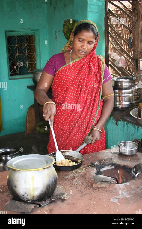 Indian lady cooking hi-res stock photography and images - Alamy