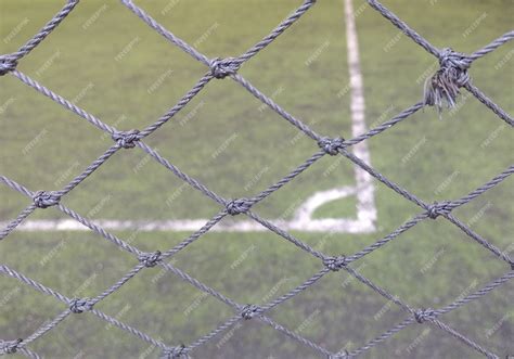 Premium Photo | Mesh fence barrier.