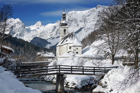 Church with Alps mountains in the snow in winter Photograph by IPics Photography - Fine Art America