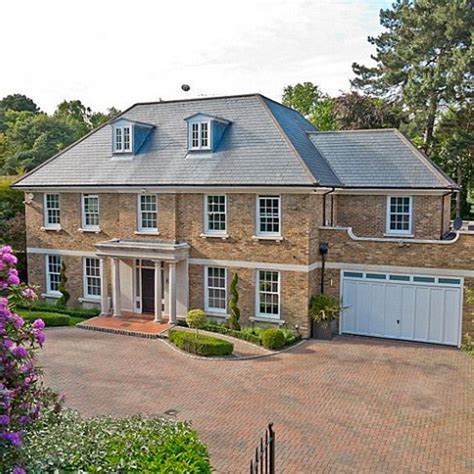 Eamonn Holmes and Ruth Langsford slash price of their surrey mansion