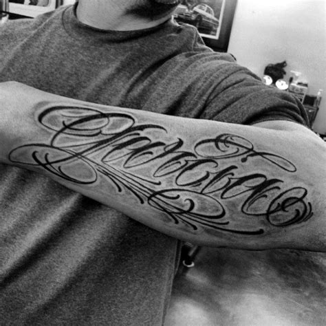 40 Forearm Name Tattoos For Men - Manly Design Ideas