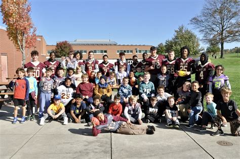 Governor Mifflin High School football players hit the books with elementary students