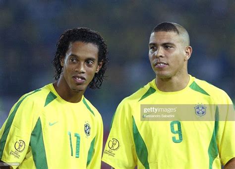 Ronaldinho of Brazil and Ronaldo Luís Nazário de Lima of Brazil look... | Ronaldo, Ronaldo luís ...