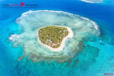 - Aerial view of Tavarua, heart shaped island, Mamanucas, Fiji ...