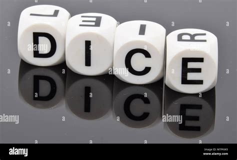 The word DICE spelt out with letter dice Stock Photo - Alamy