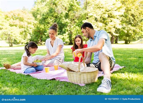 Happy Family Having Picnic at Summer Park Stock Image - Image of child, lifestyle: 152730951