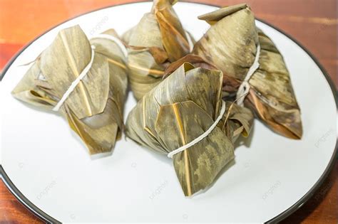 Zongzi In A Plate Zhongzi Is A Traditional Chinese Food Eaten During Dragon Boat Festival Photo ...