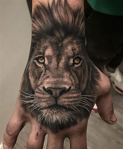 50 Eye-Catching Lion Tattoos That’ll Make You Want To Get Inked | Lion head tattoos, Lion hand ...