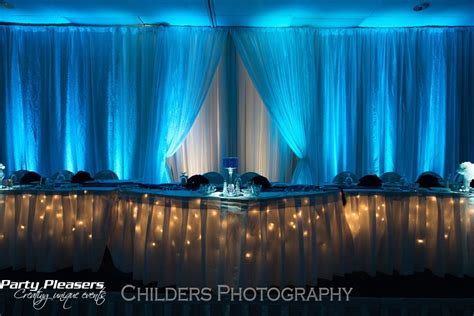 Hope Hotel & Conference Center | Wall drapes, Light table, White walls