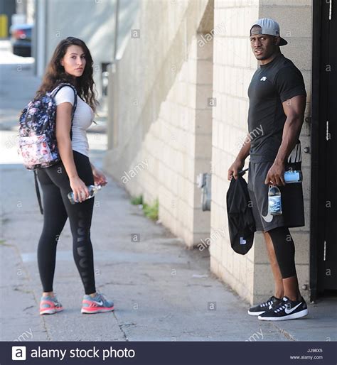 Reggie Bush and his wife Lilit Avagyan. Reggie Bush and his wife Stock ...