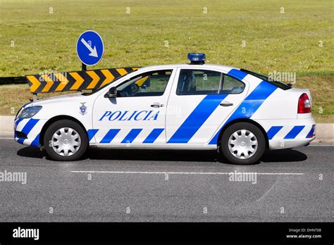 Portuguese police car next to traffic signs and a green field Stock Photo - Alamy