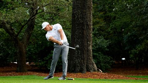 Bryson DeChambeau plays a stroke from the No. 2 tee during the first round of the Masters at ...