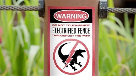 Jurassic World Electrified Raptor Fence Metal Sign