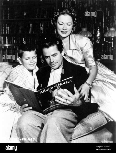 ELEANOR POWELL and husband GLENN FORD at home with their son PETER FORD circa 1952 publicity for ...