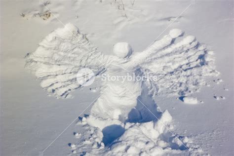 Angel In The Snow Royalty-Free Stock Image - Storyblocks