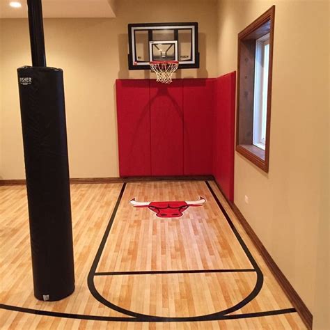 Turning a small space into usable space! Chicago Bulls mini court. | Home basketball court ...
