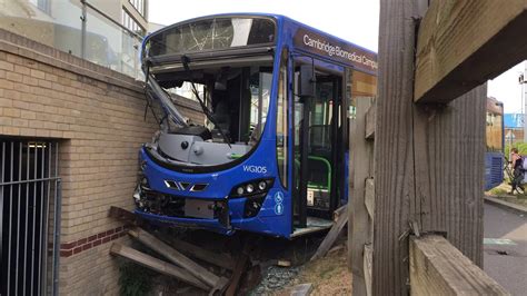 PHOTOS: Bus crashes into wall after 'veering to avoid cyclists' - Cambridgeshire Live