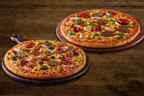 Order Two Loaded Non Veg Medium Pizza Combo online from Ovenstory