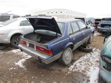 Curbside Recycling: 1988 Cadillac Cimarron - Sort Of Like The Baby Ruth ...