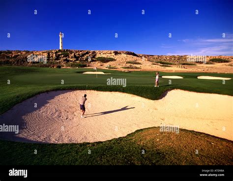 Two men golfing at Tierra Del Sol Golf Course Aruba Stock Photo ...