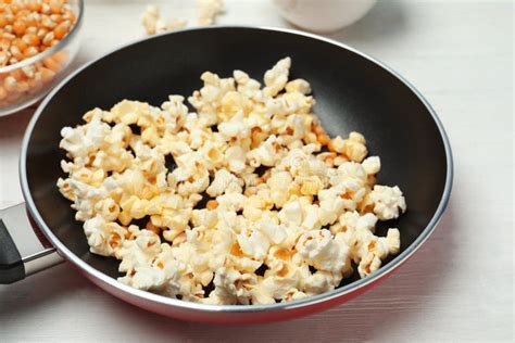 Frying Pan with Tasty Popcorn Stock Image - Image of cereal, cinema ...