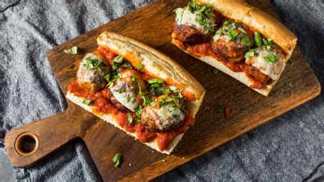 Epic 'Meatball Parm Sandwiches on Garlic Bread' Leave Us Speechless - Delishably News