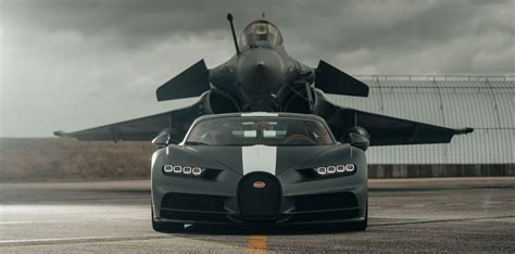 Watch a Bugatti Chiron Race a French Fighter Jet - Maxim