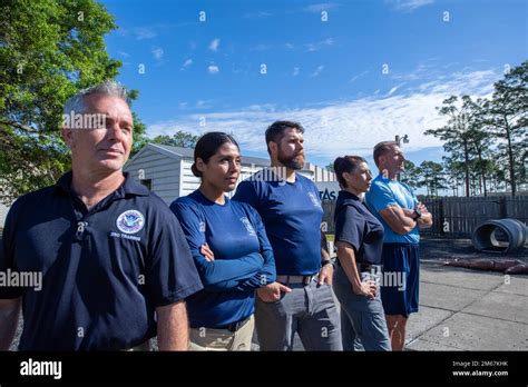 ICE Enforcement and Removal Operations (ERO) Instructors pose for photos at the Federal Law ...