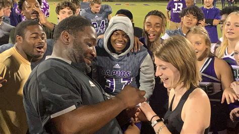 TOUCHDOWN: James River H.S. football coach proposes to cheerleading coach | WRIC ABC 8News