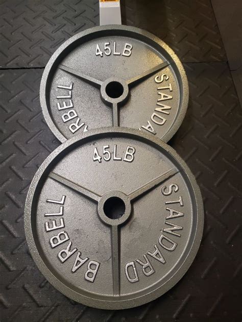 *SALE PENDING* Olympic weight plates - 45 lbs each for Sale in Phoenix, AZ - OfferUp