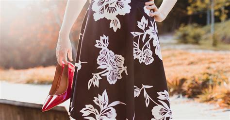Woman Wearing Skirt Holding Her Shoes · Free Stock Photo