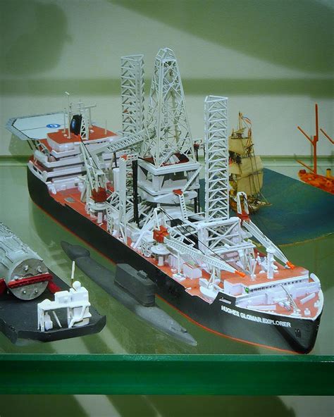 A 1:1250 scale model of the Hughes Glomar Explorer beside K-129 which it was purpose built to ...