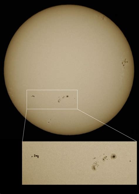 Absolutely Amazing: ISS, Discovery Transit Sun Near Active Sunspot Region - Universe Today