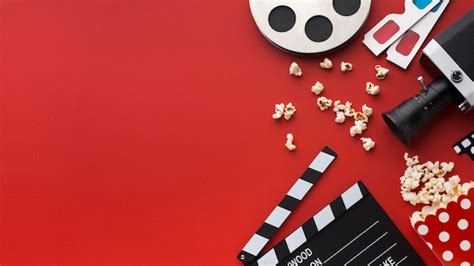 Free Photo | Assortment of cinema elements on red background with copy space