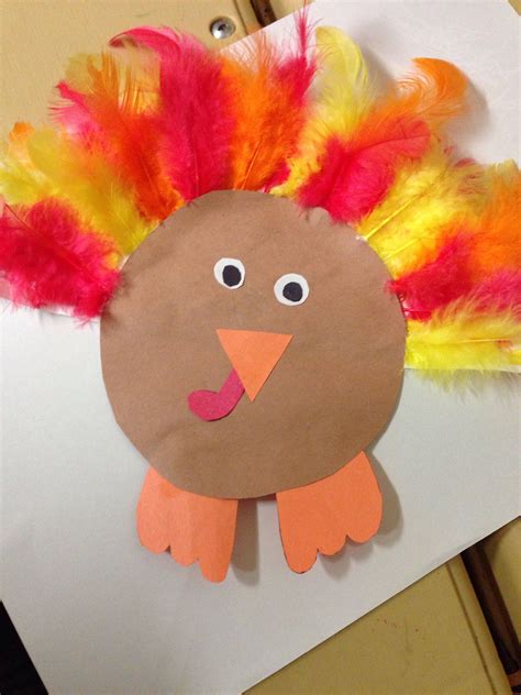 Thanksgiving craft | Thanksgiving crafts for kids, Feather crafts ...