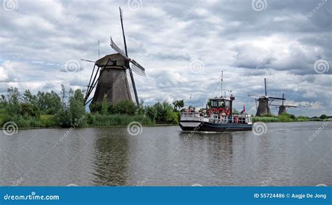 Windmills and Tour Boat at Kinderdijk Editorial Photo - Image of windmill, window: 55724486