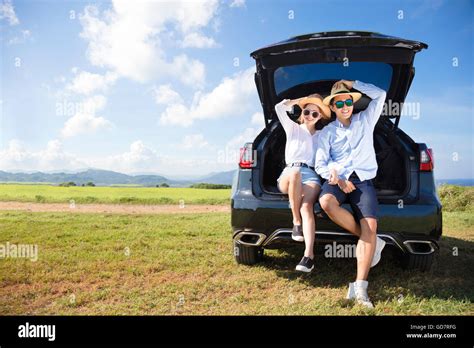 young couple enjoying road trip and summer vacation Stock Photo - Alamy