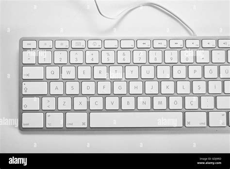 White computer keyboard on a white background Stock Photo - Alamy