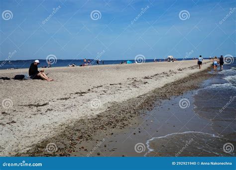 Beach with Vacationers on the Coast of the Baltic Bay in the Village of Rewa, Poland Editorial ...