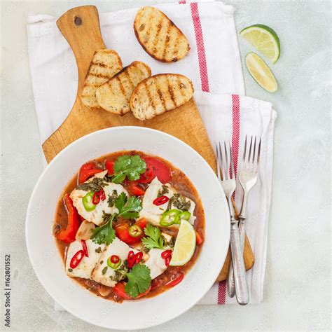 Tomato and Coconut Milk Fish Stew Stock Photo | Adobe Stock