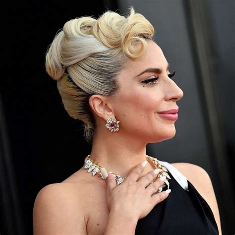 Lady Gaga reacts to 2023 Oscar nomination for her song 'Hold My Hand ...