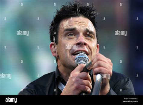 British singer musician Robbie Williams performing at Murrayfield Stadium, Edinburgh, Scotland ...