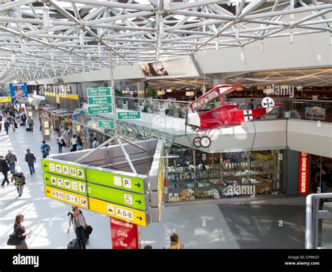 Berlin - Tegel Airport arrivals and departures area Stock Photo - Alamy