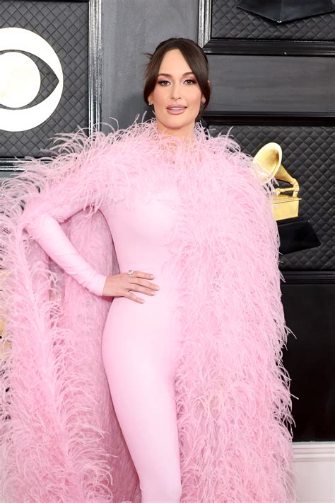 Kacey Musgraves rocks pink feathers on Grammys 2023 red carpet