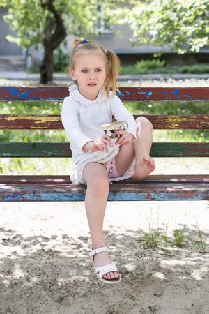 Photo of Beautiful little girl sitting - ID:102165947 - Royalty Free Image - Stocklib