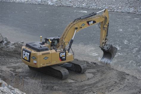 Excavator from the Caterpillar Brand Editorial Image - Image of ...