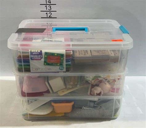 Three piece storage bin with crafting supplies, top is cracked - Hash Auctions