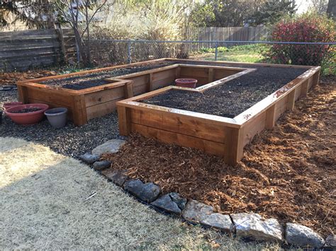 Our raised vegetable planter I made from Cedar Tone lumber: 2x10s for side walls, 2x6s for top ...